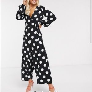 ASOS DESIGN wrap tie jumpsuit in mono polka dot